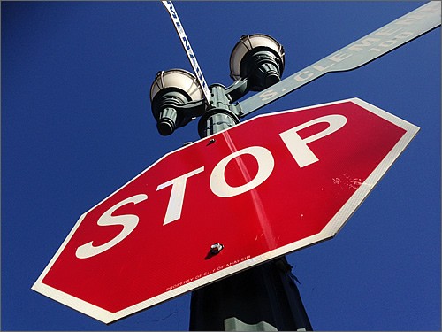 Stop and think at stop sign.